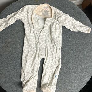 Simply footie onesie with magnetic buttons.